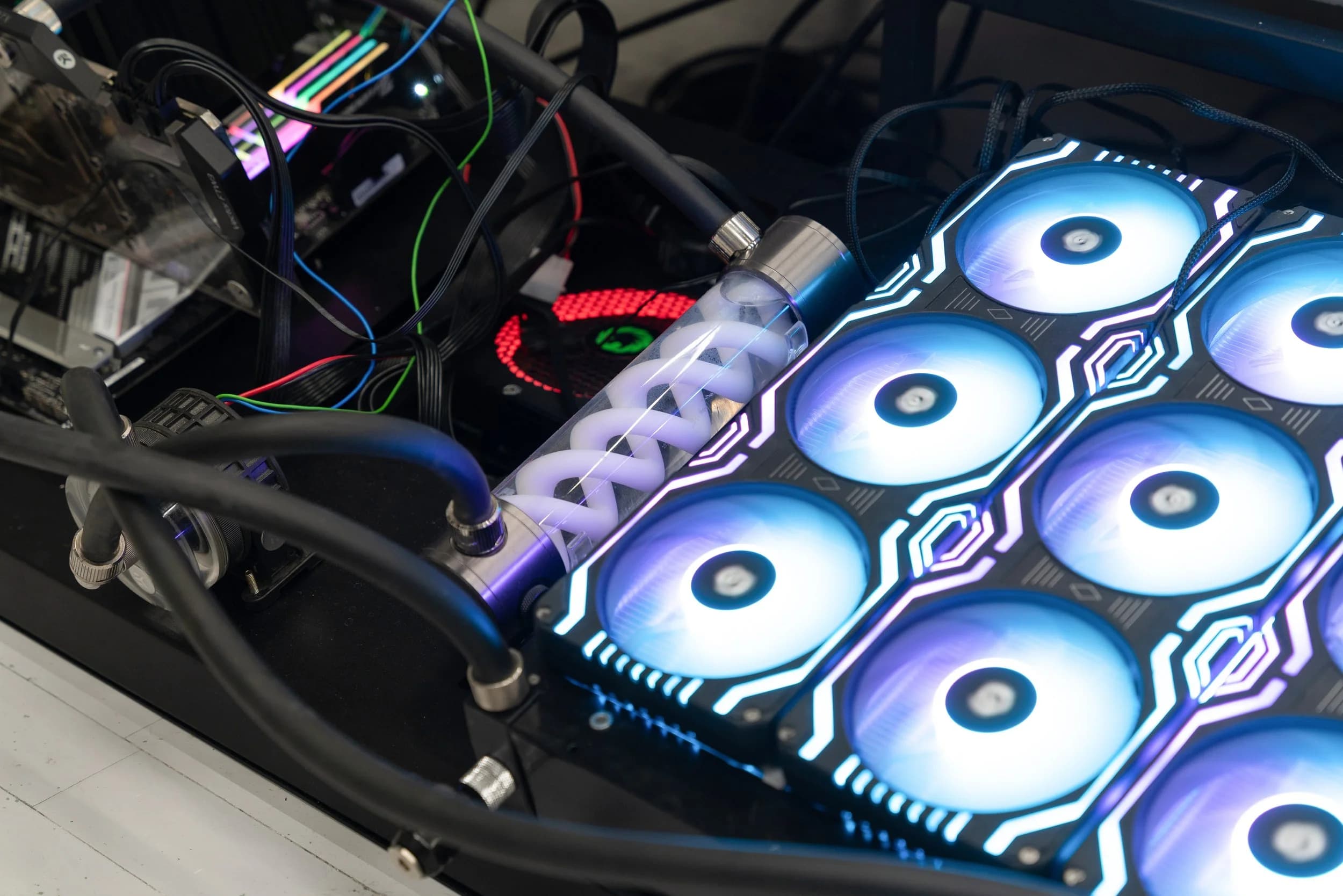 Bed PC: close-up of the water-cooling system, tubing and illuminated fans